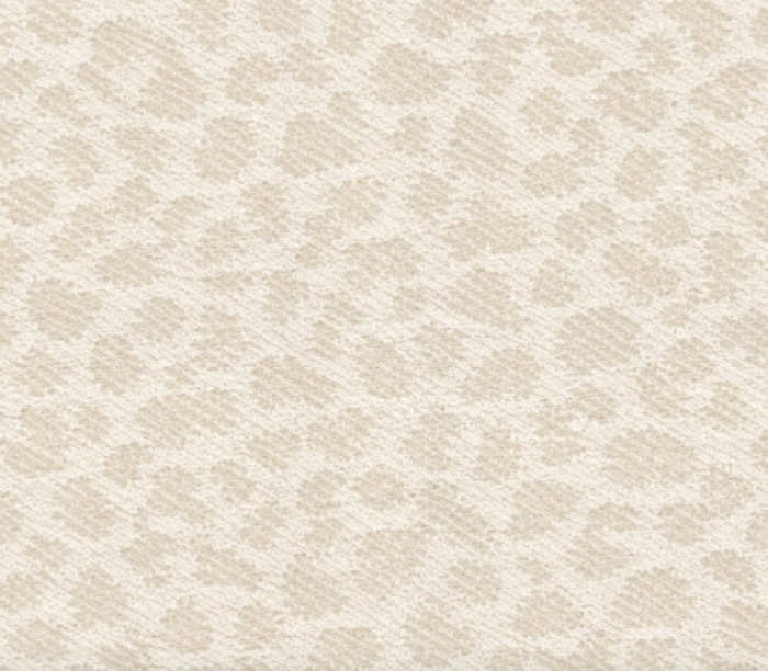 A subtle ivory and beige animal print upholstery fabric