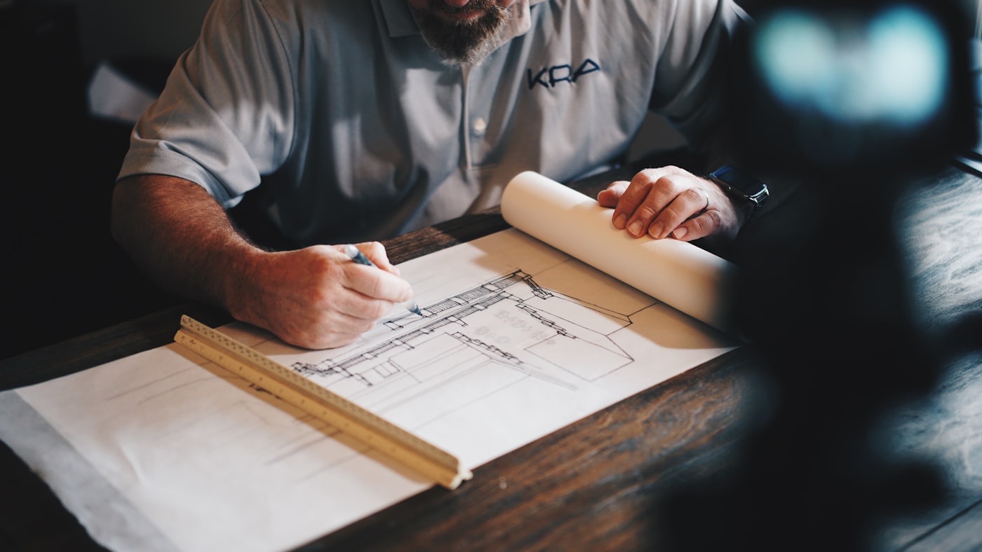 Builder liaison reviewing plans